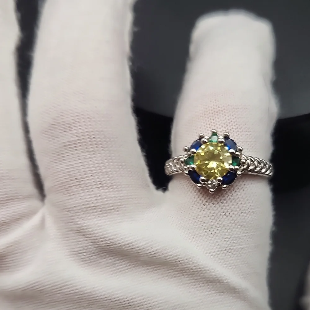 Elegant Silver Ring with Yellow and Blue Stones